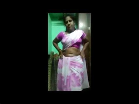 sexy mallu aunty|Tamil Mom dress change captured his neighbours son